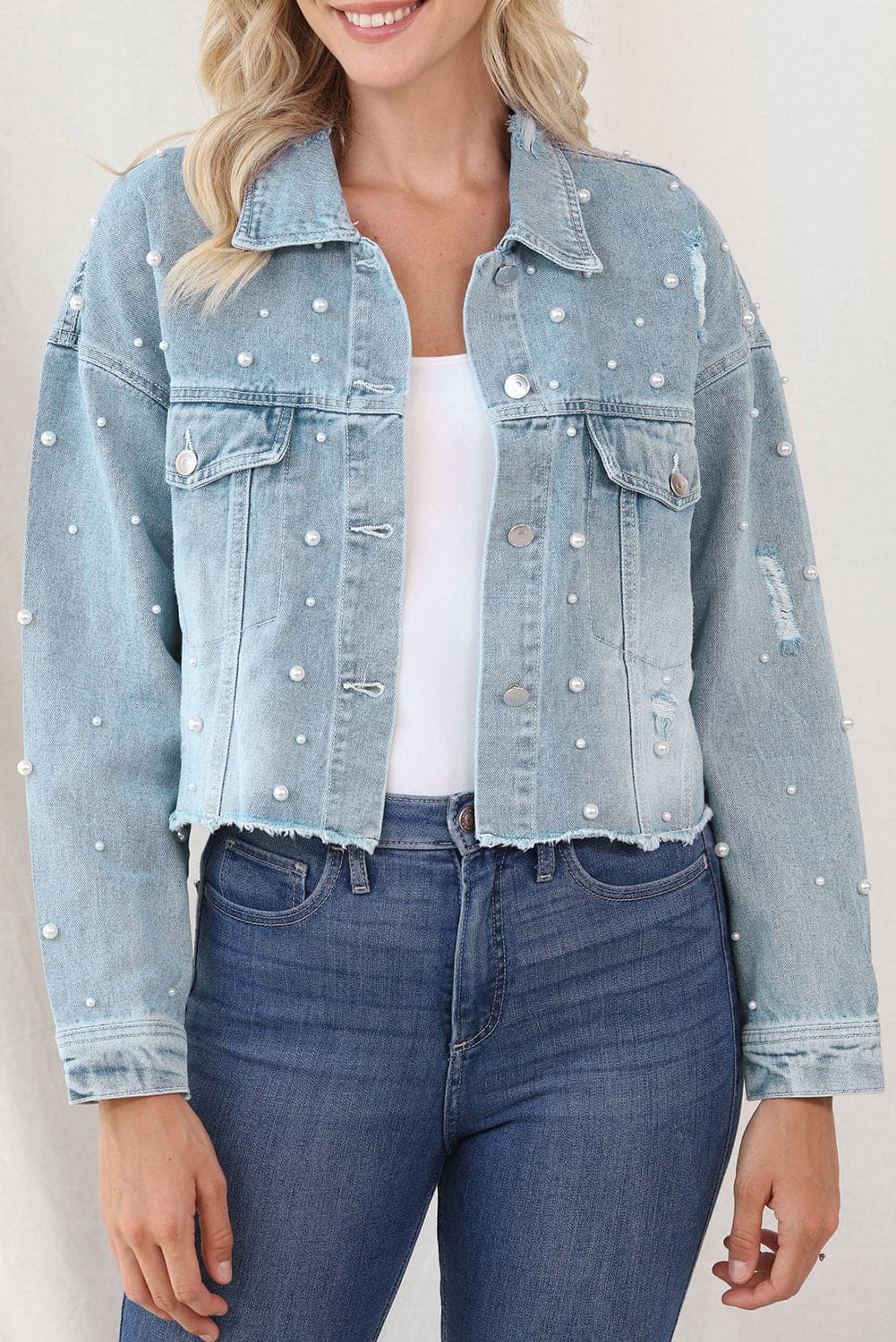 Distressed Pearl Trim Button Up Denim Jacket.