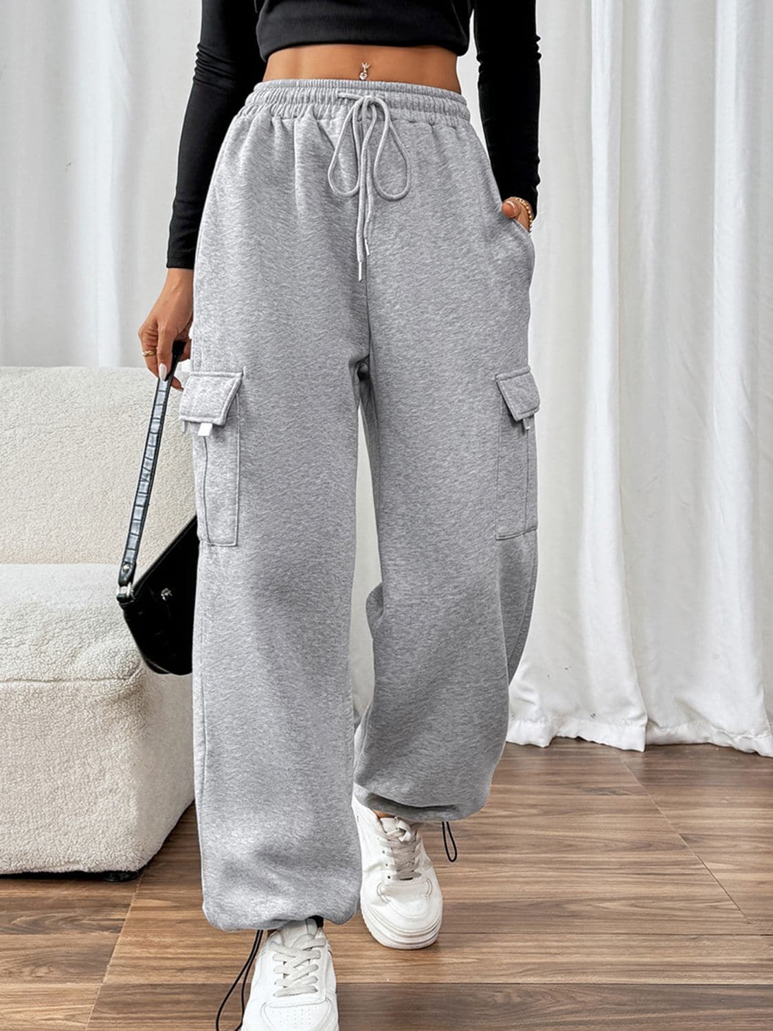 Perfee Drawstring Elastic Waist Joggers with PocketsFeatures: Drawstring, Pocketed
Sheer: Opaque
Material composition: 85% polyester, 15% cotton
Care instructions: Machine wash cold. Tumble dry low.
Imported


Size
USLove Salve Perfee Drawstring Elastic Waist JoggersPants