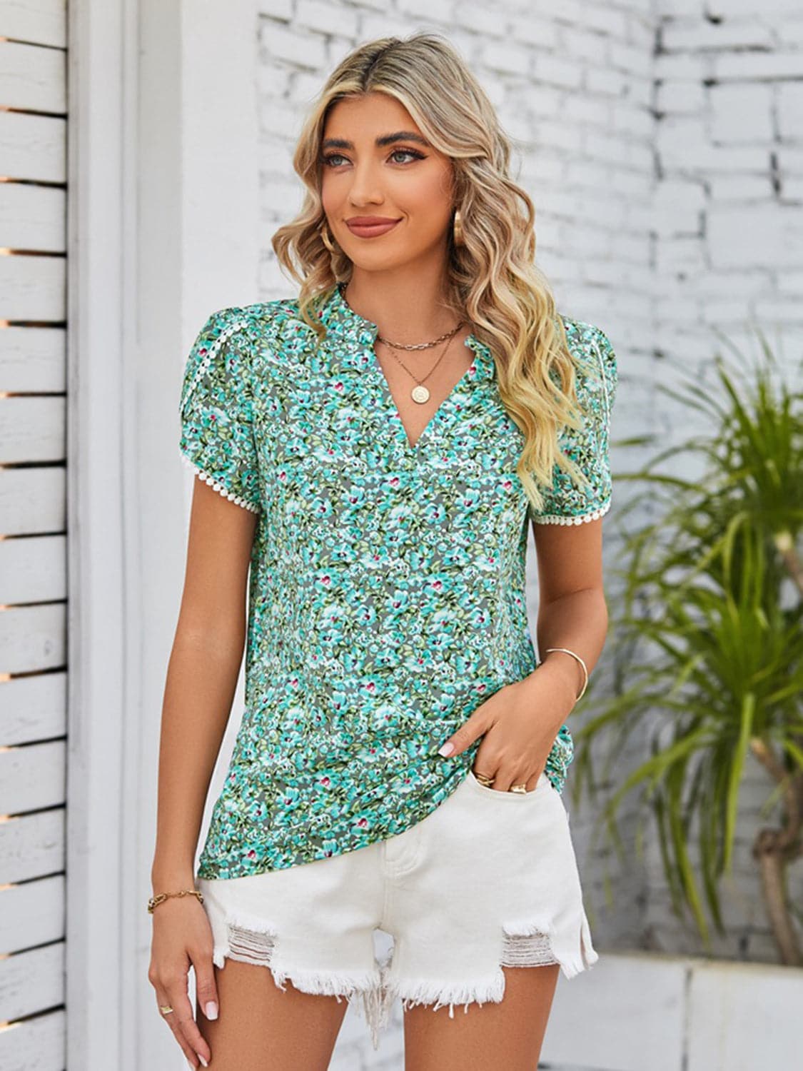 Floral Notched Neck Blouse.