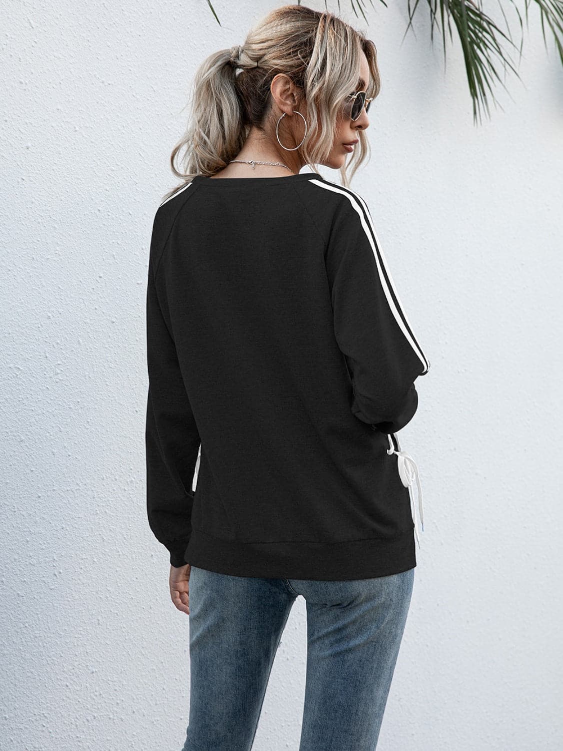 Lace-Up Round Neck Long Sleeve Sweatshirt.