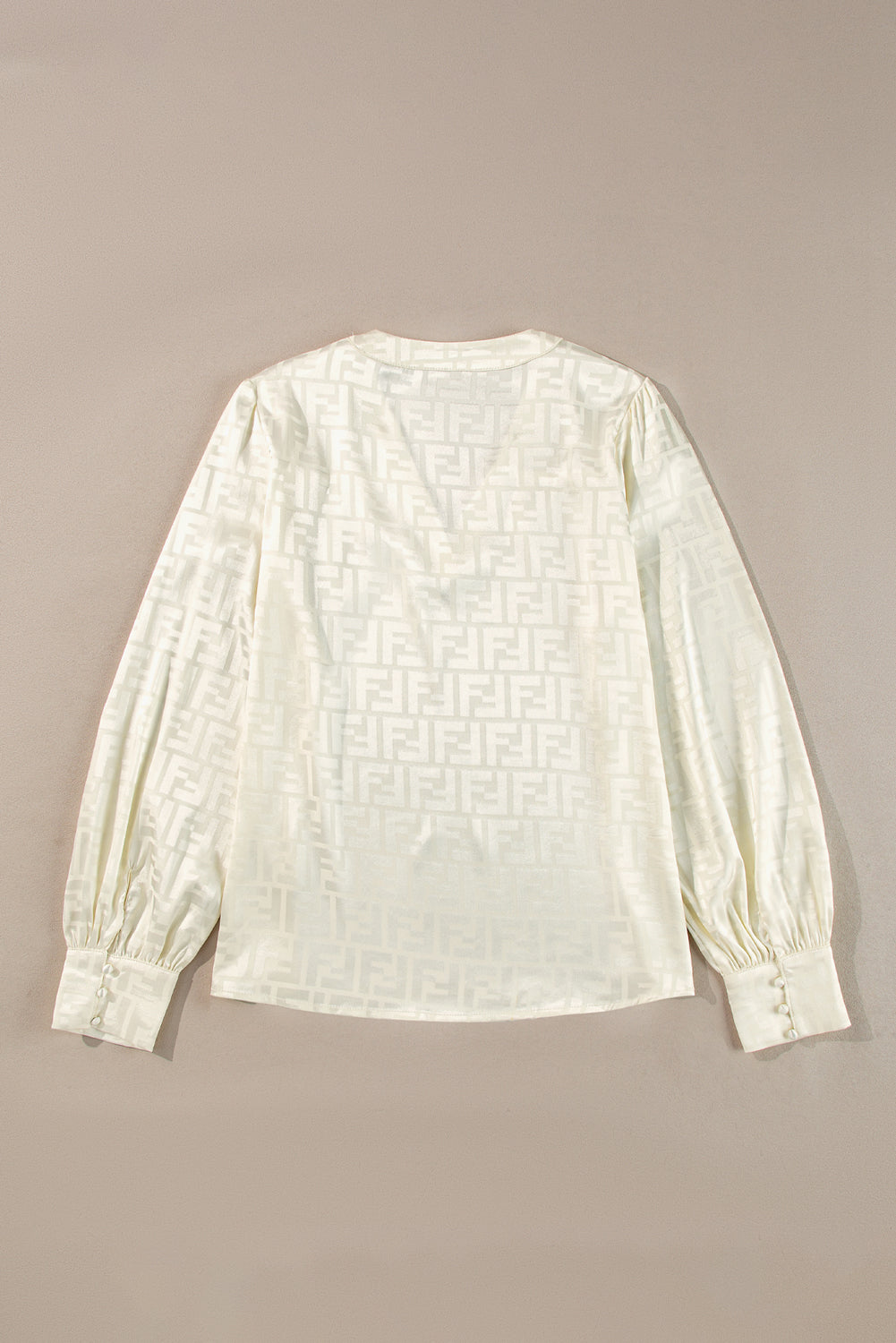 Chic oatmeal jacquard blouse with v-neck and bishop sleeves