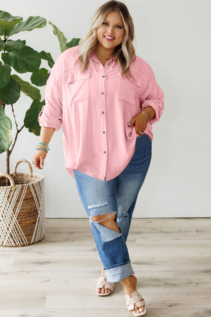 Chic pink plus size button-down shirt with flap pockets and roll-tab sleeves