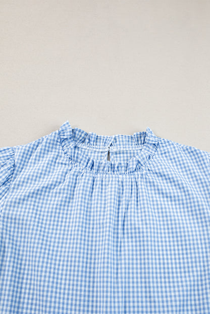 Light blue floral embroidered blouse with puff sleeves and gingham pattern