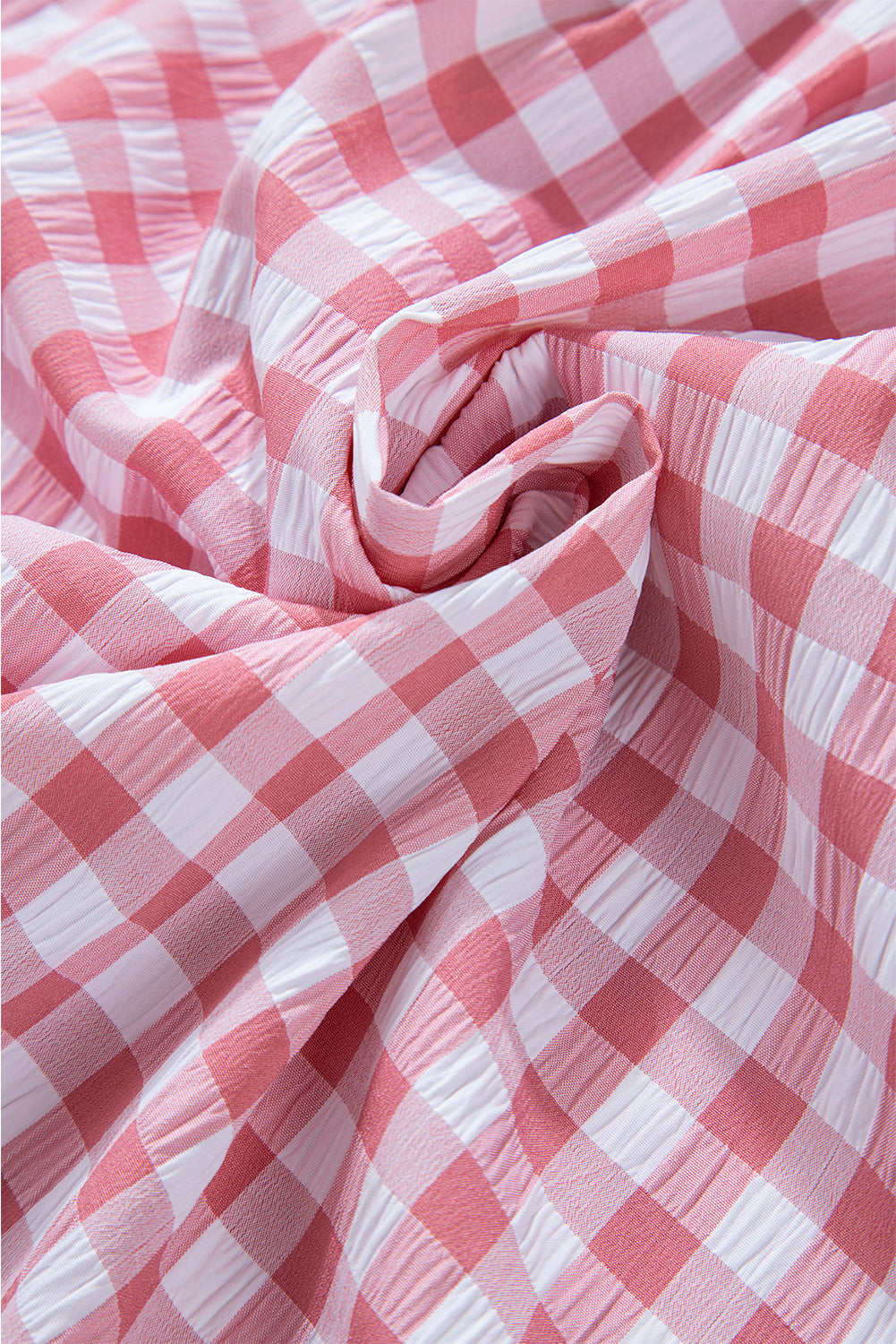 Chic pink gingham collared shirt with functional chest pockets