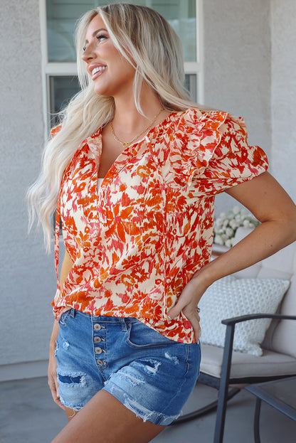 Vibrant Orange Ruffled Floral Blouse with Puff Sleeves and Split Neckline