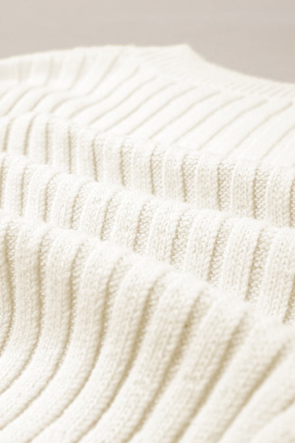 Cable-Knit Round Neck Long Sleeve Sweater.