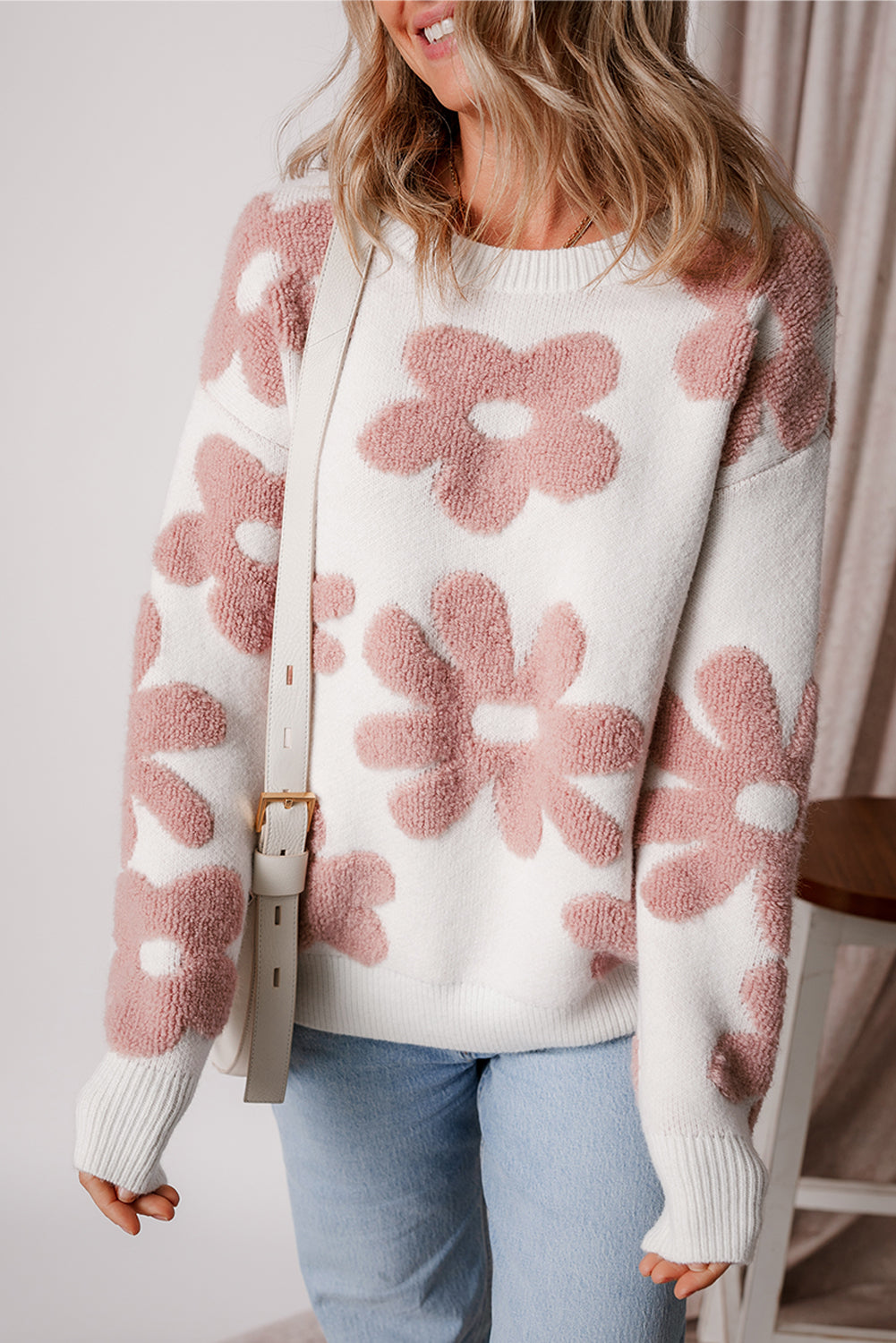 Floral-inspired white drop shoulder sweater for relaxed winter vibes