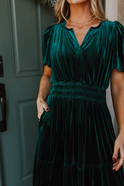 Evergreen velvet tiered maxi dress with shirred waist and short sleeves