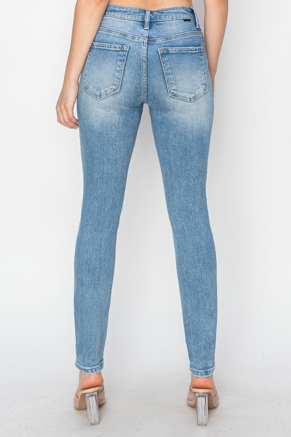 Risen Full Size High Rise Knee Distressed Skinny Jeans.