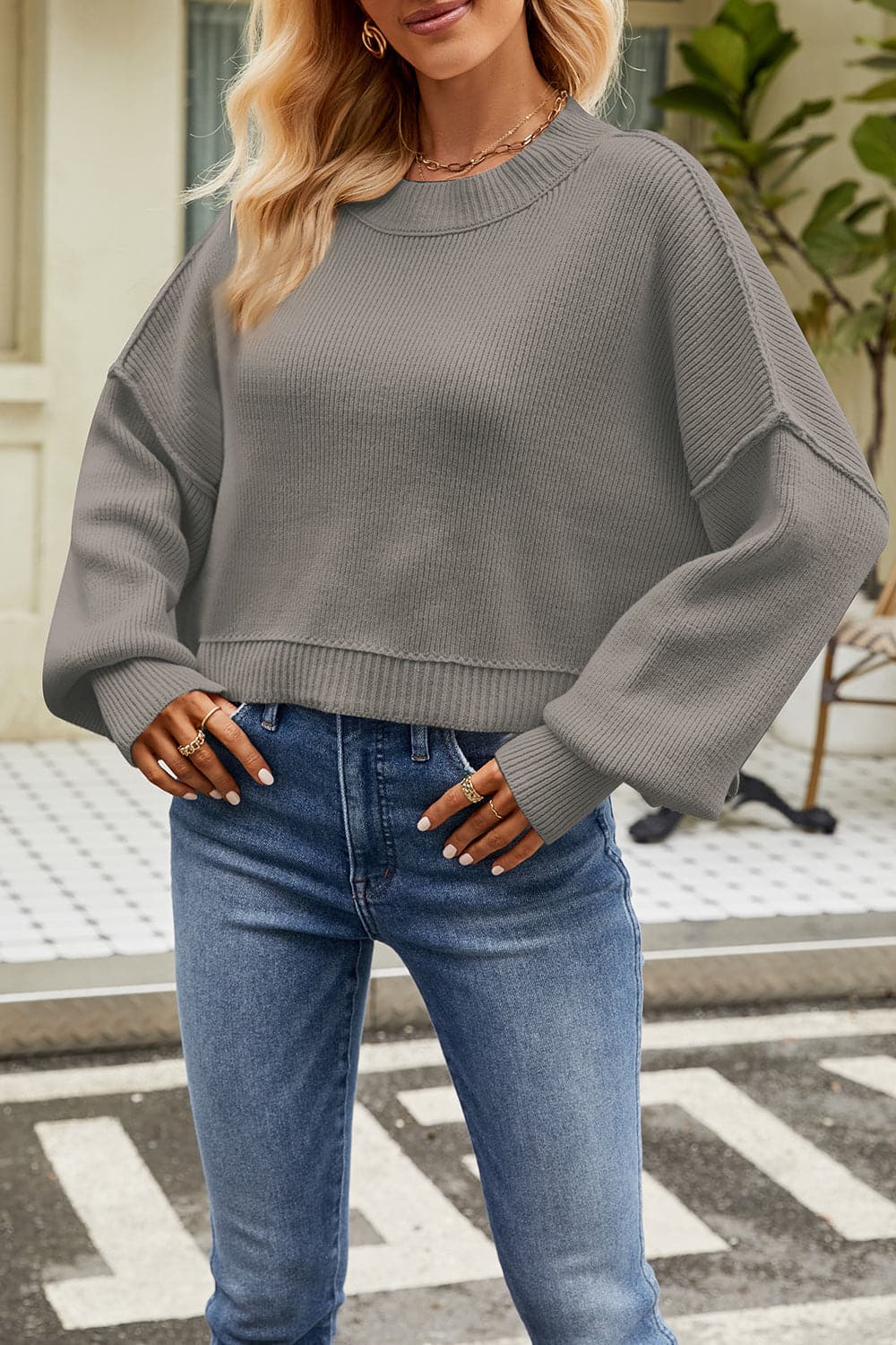 Round Neck Dropped Shoulder Sweater.