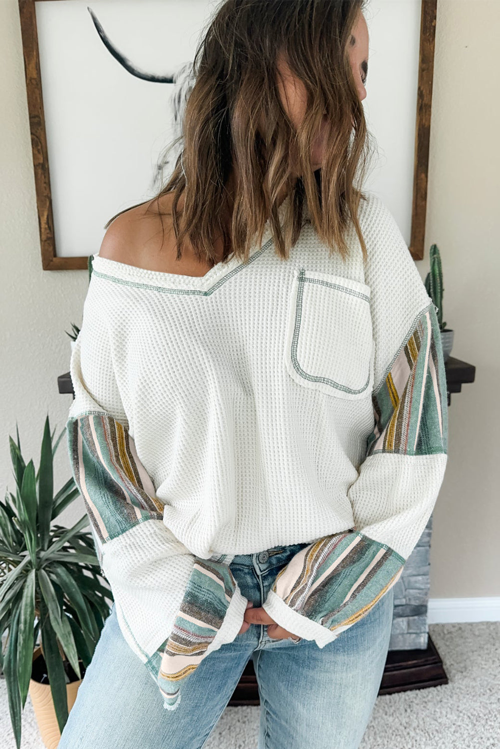 Chic white striped patchwork waffle knit top with exposed seams