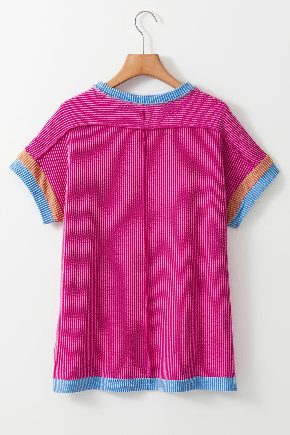 Vibrant pink textured t-shirt with stylish contrast trim