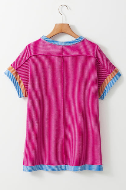 Vibrant pink textured t-shirt with stylish contrast trim