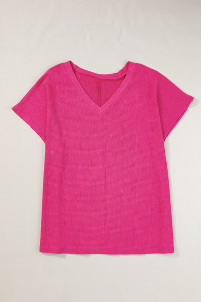 Vibrant pink textured bubble hem top for plus sizes