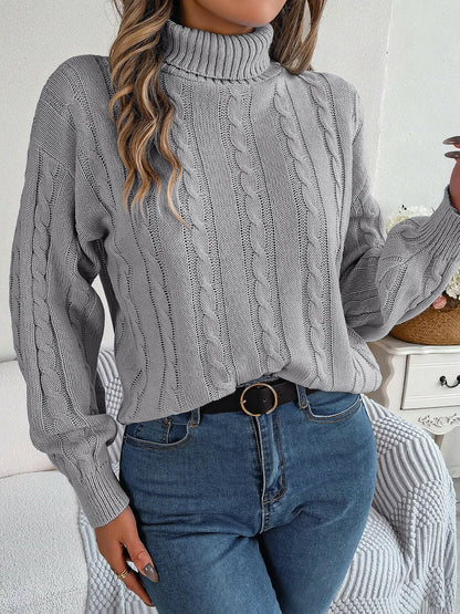 Cable-Knit Turtleneck Dropped Shoulder Sweater.