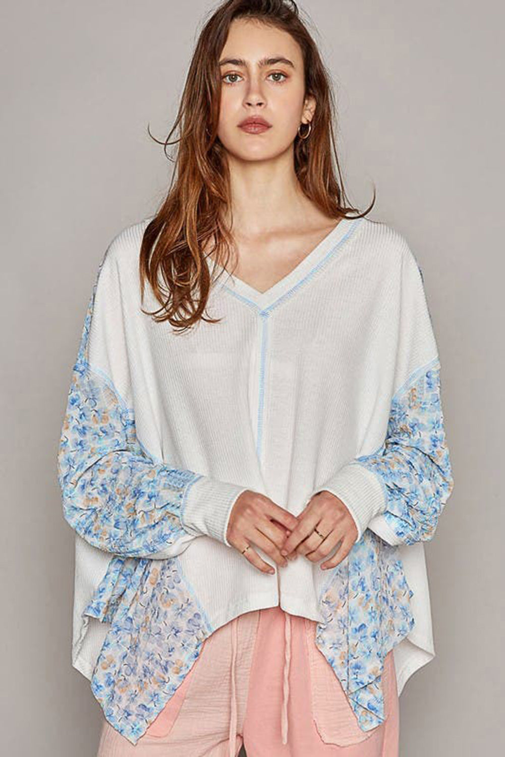 Chic white floral patchwork batwing blouse with V-neck design