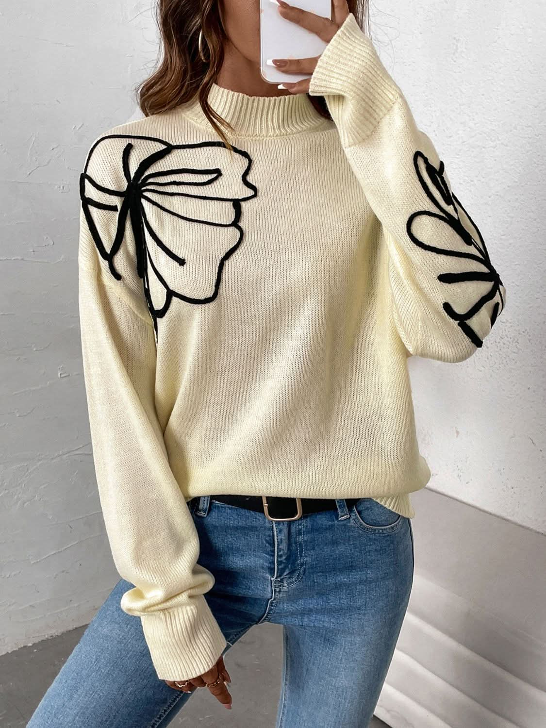 Cozy mock neck sweater with dropped shoulders and long sleeves