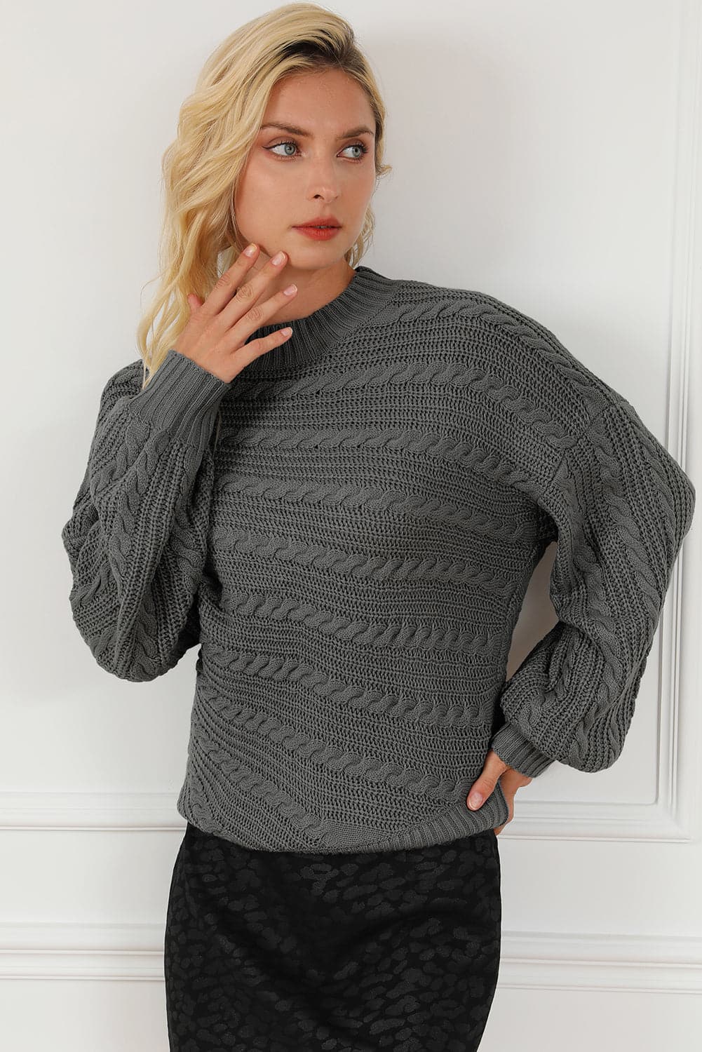 Cable-Knit Mock Neck Dropped Shoulder Sweater.