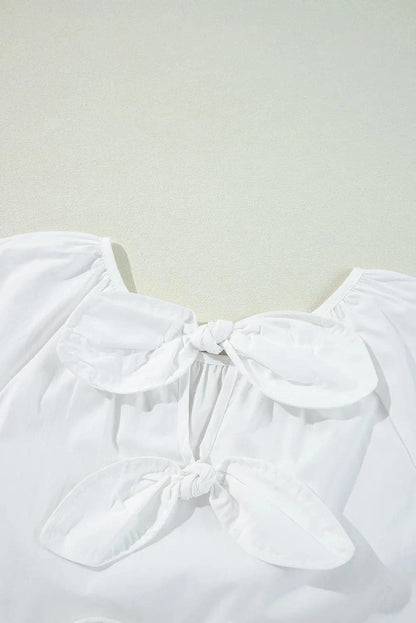 Elegant cotton blouse with bow