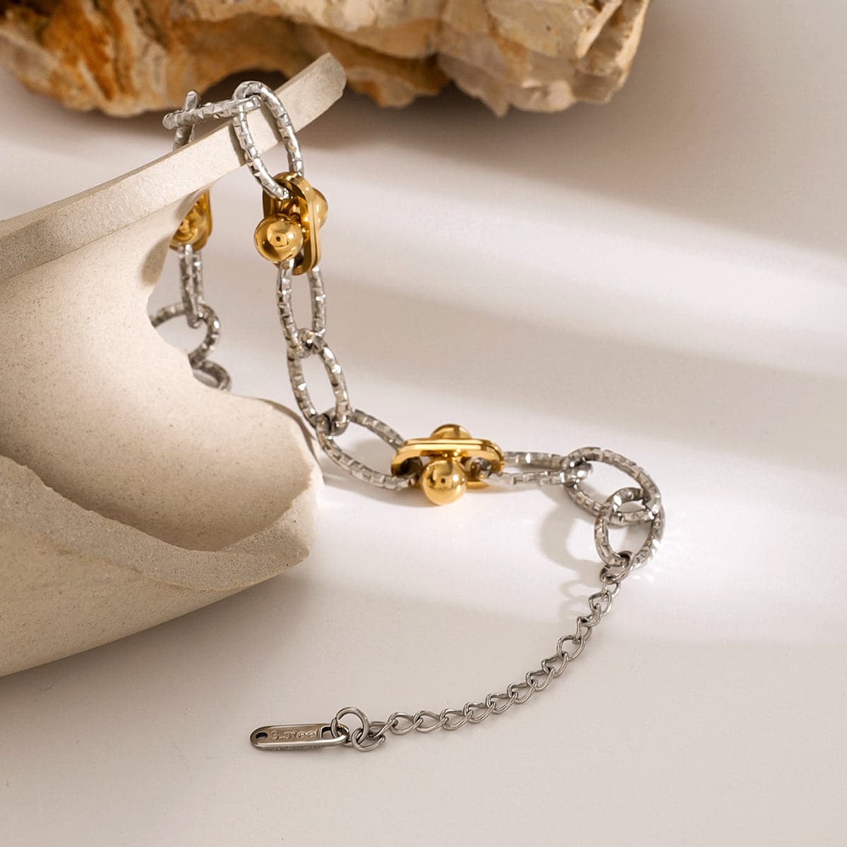 Elegant stainless steel and gold-plated chain bracelet