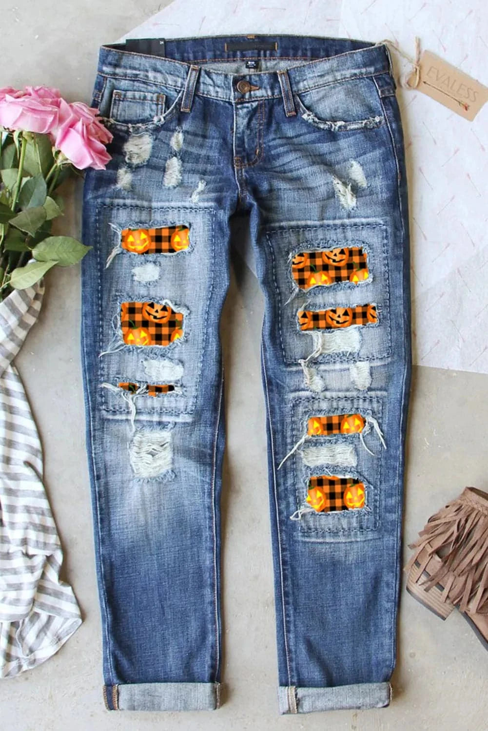 Distressed Pumpkin Pattern Jeans with PocketsFeatures: Distressed
Stretch: Slightly stretchy
Material composition: 75% cotton, 24% polyester, 1% elastane
Care instructions: Machine wash cold. Tumble dry low.
ImLove Salve Distressed Pumpkin Pattern JeansJeans