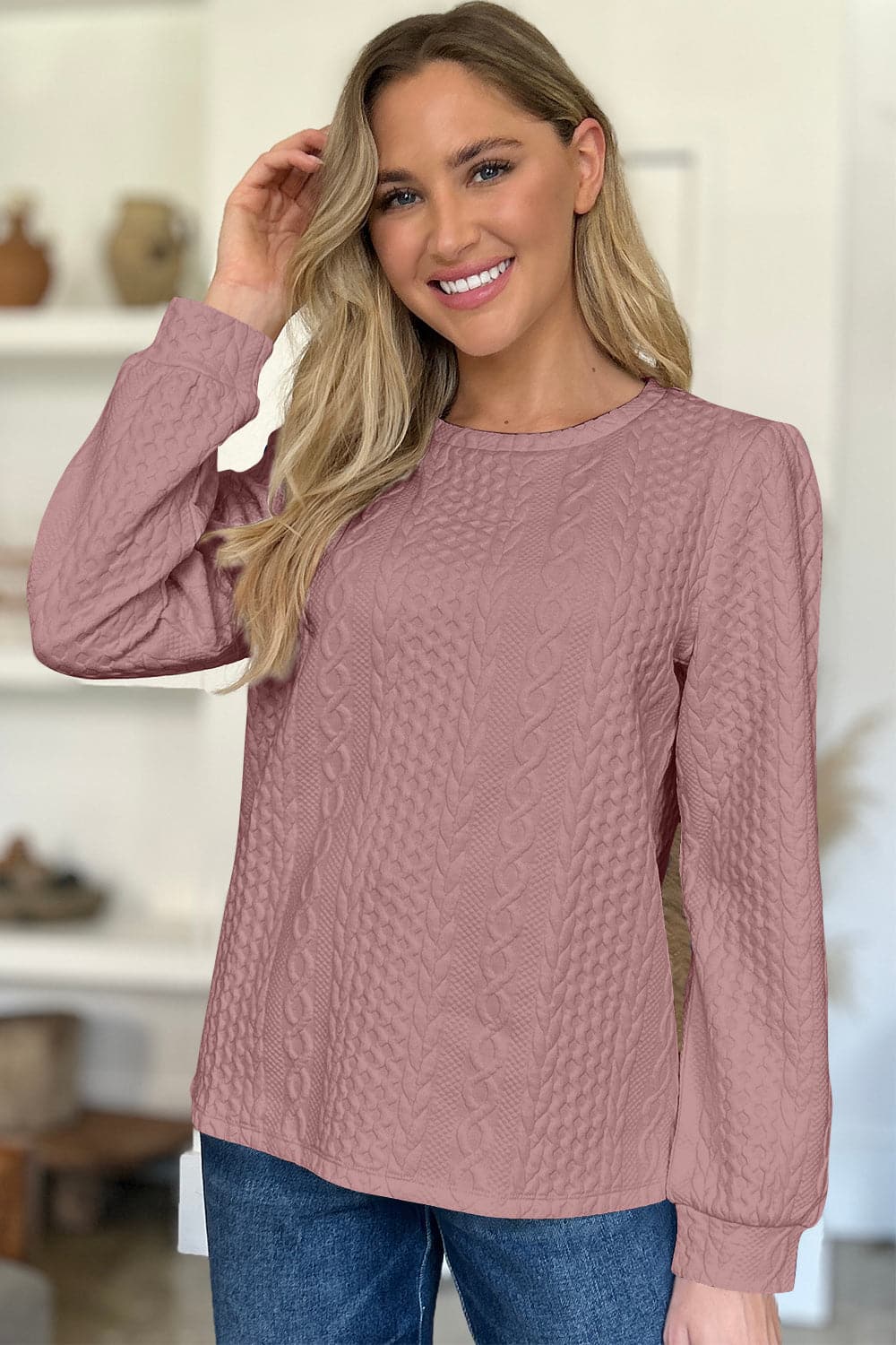 Textured Round Neck Long Sleeve Sweatshirt.