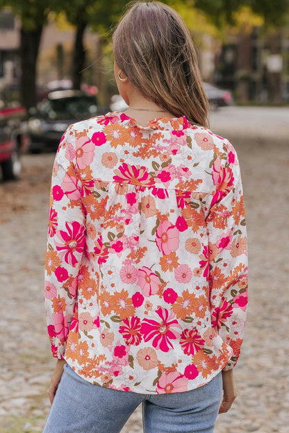 Floral V-Neck Frill Long Sleeve BlouseFloral V-Neck Frill Long Sleeve Blouse
 Indulge in elegance with our Floral V-Neck Frill Long Sleeve Blouse, a versatile piece that seamlessly combines sophisticatioLove Salve -Neck Frill Long Sleeve BlouseBlouses