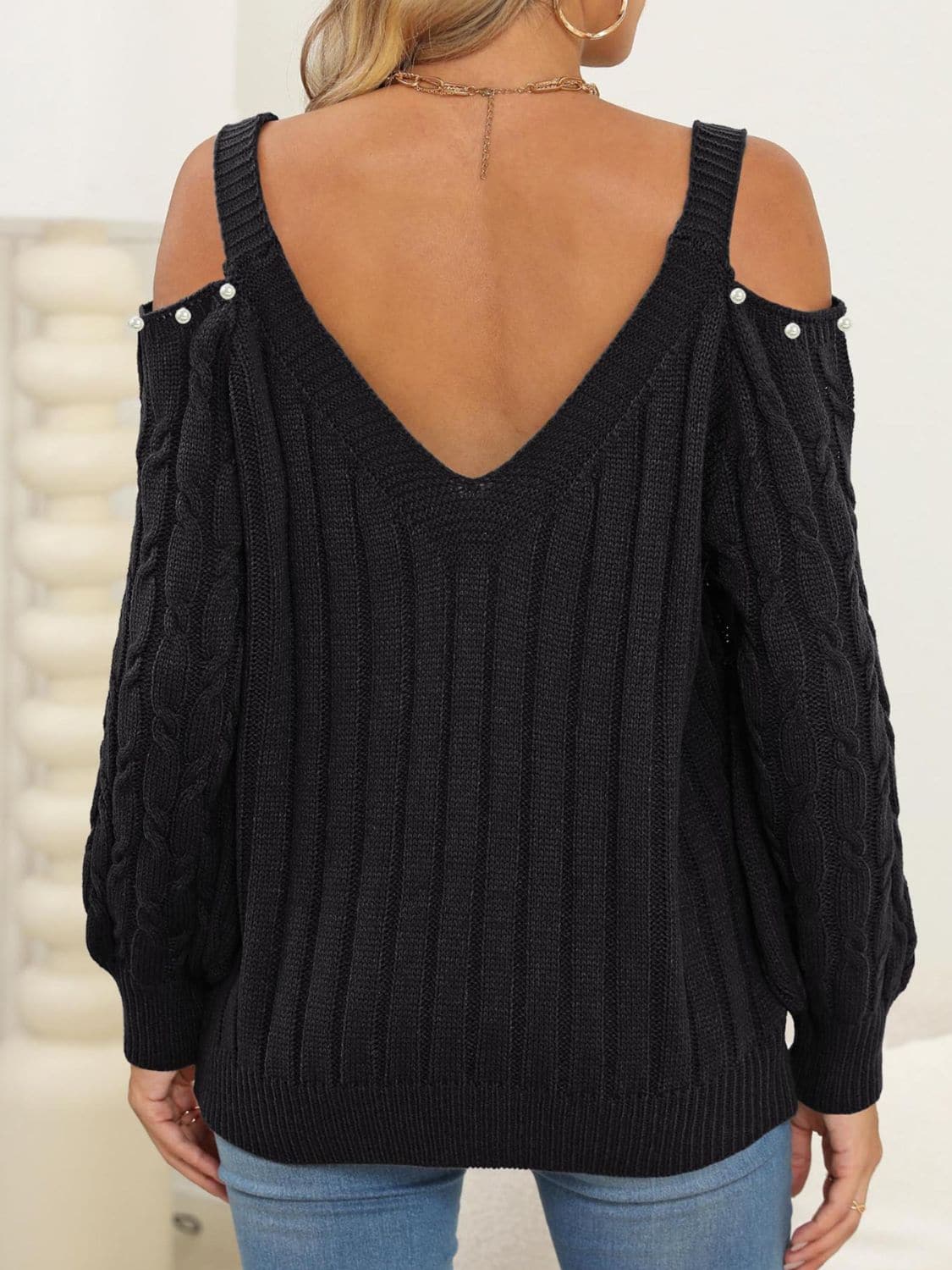 Chic cable-knit cold shoulder sweater