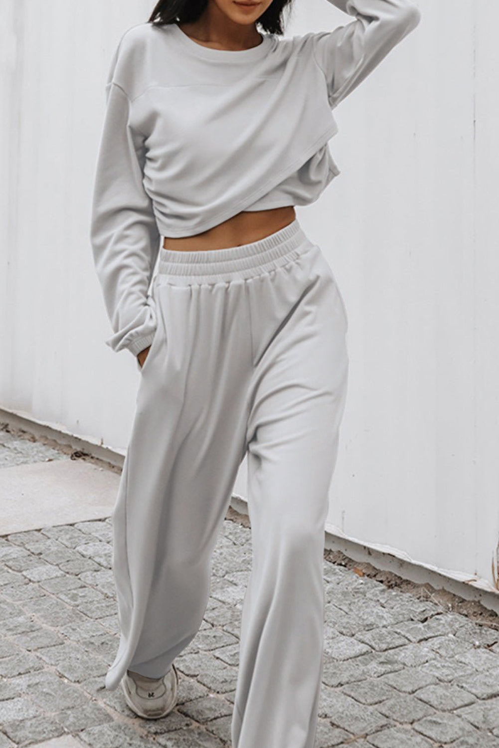 Chic light grey criss cross activewear set for effortless style