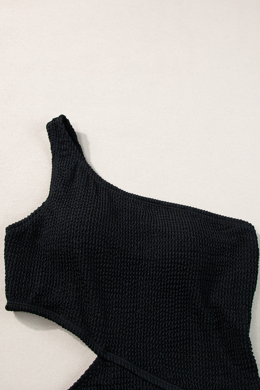 Asymmetric black cut-out ribbed monokini swimsuit