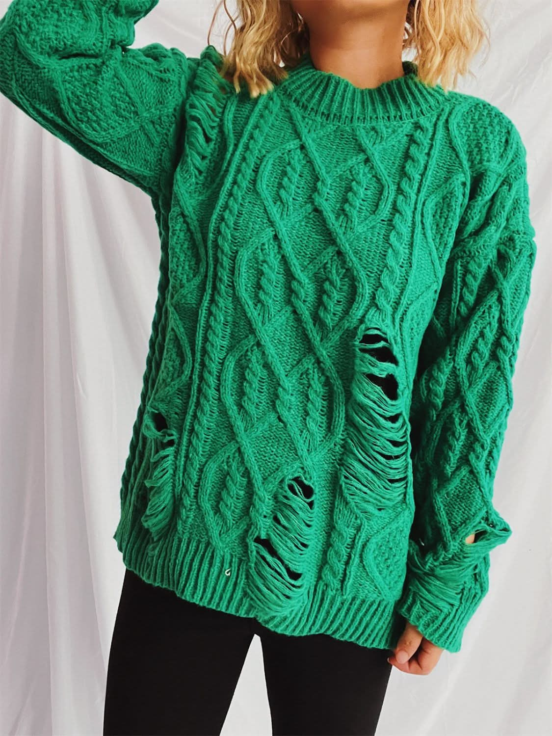 Chic distressed cable-knit sweater