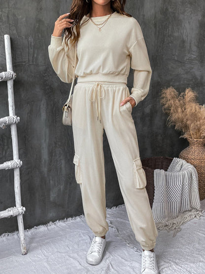 Chic tied long sleeve top and pants ensemble