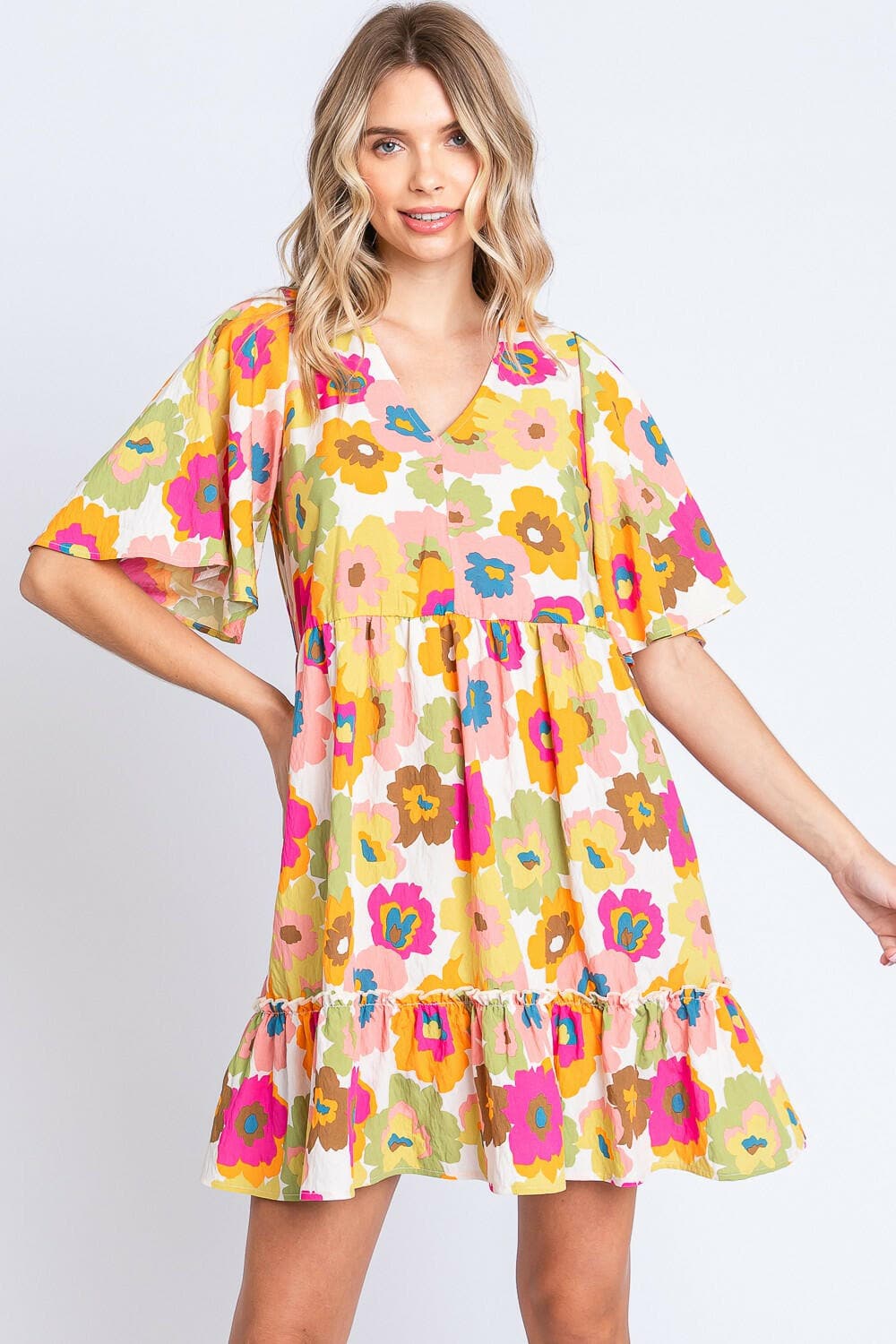 GeeGee Full Size Floral V-Neck Ruffle Trim Mini DressDiscover the GeeGee Full Size Floral V-Neck Ruffle Trim Mini Dress
 Step into a world of charm and elegance with the GeeGee Full Size Floral V-Neck Ruffle Trim Mini Love Salve -Neck Ruffle Trim Mini Dressusa