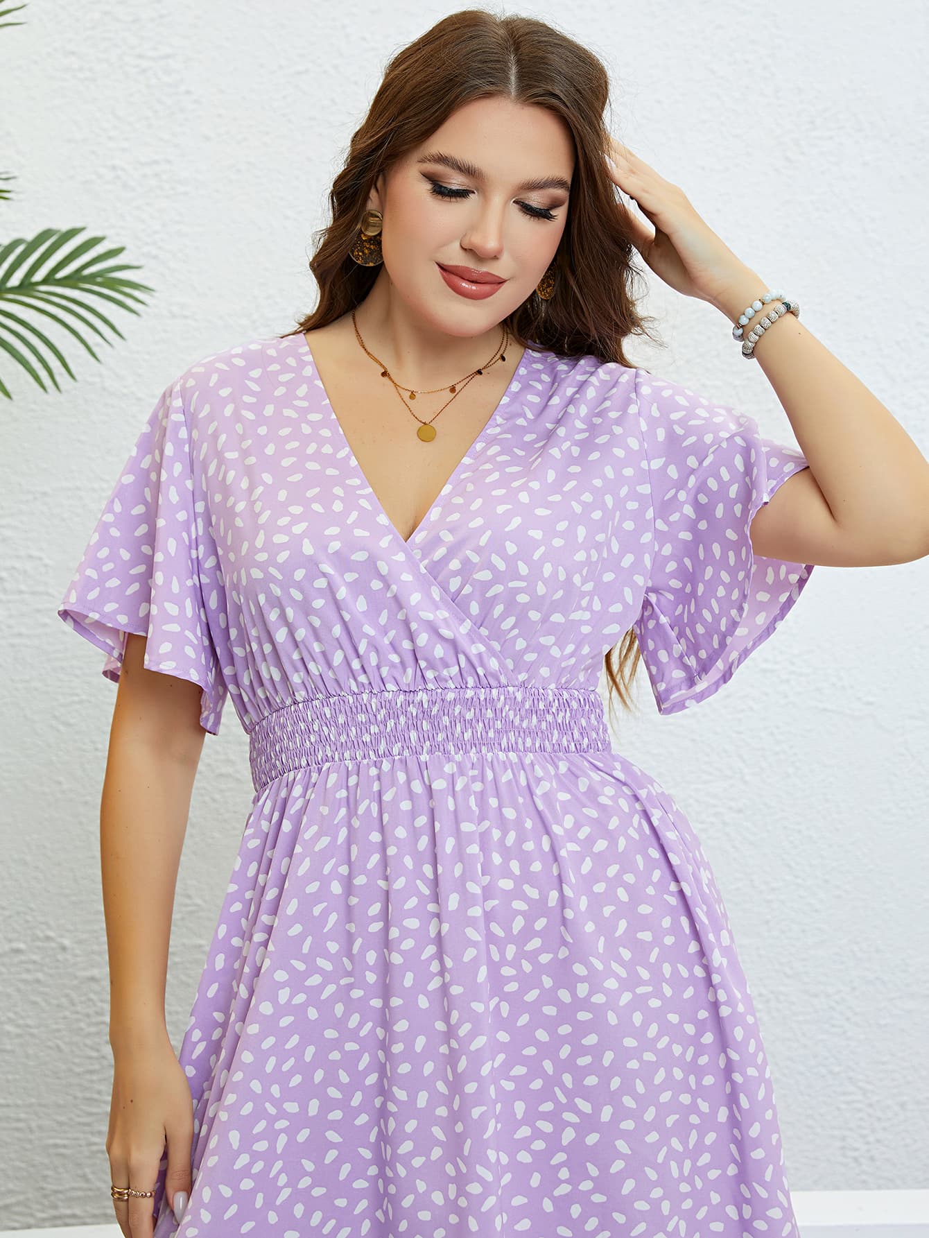 Plus Size Printed Smocked Waist Surplice Dress.