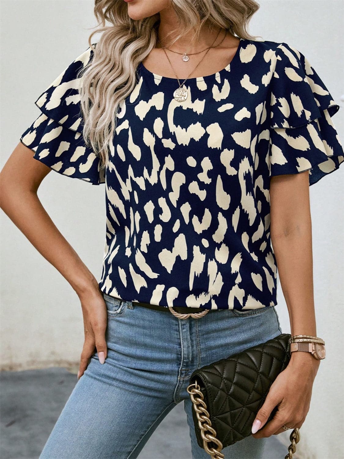 Ruffled Printed Round Neck Short Sleeve Blouse.