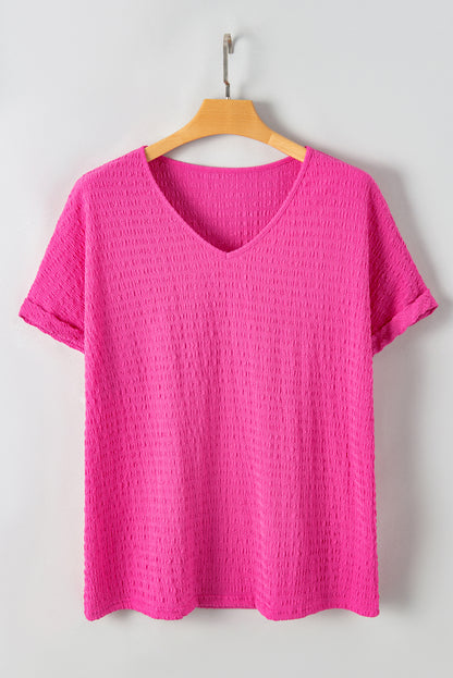 Chic bright pink plus size textured V-neck tee with folded sleeves