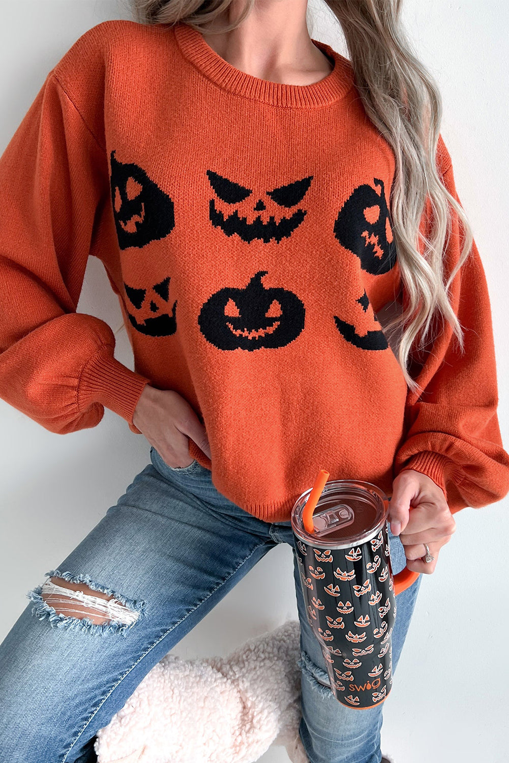 Spooky pumpkin face Halloween sweater