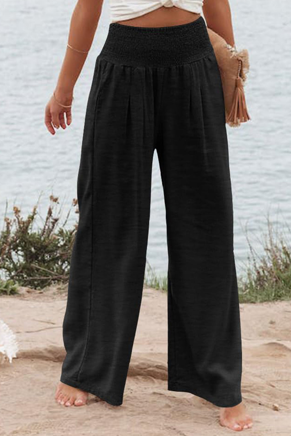 Chic black plus size wide leg pants with shirred high waist