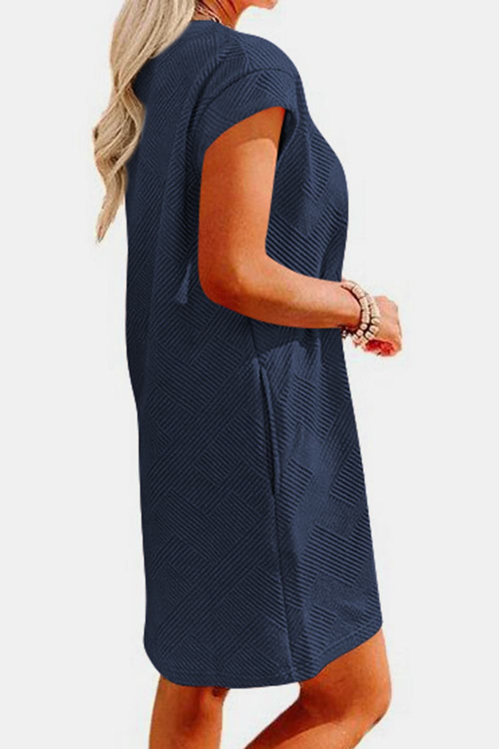 Textured Round Neck Cap Sleeve Dress.