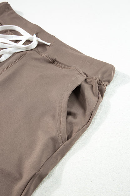 Cozy dark brown joggers with adjustable drawstring and pockets