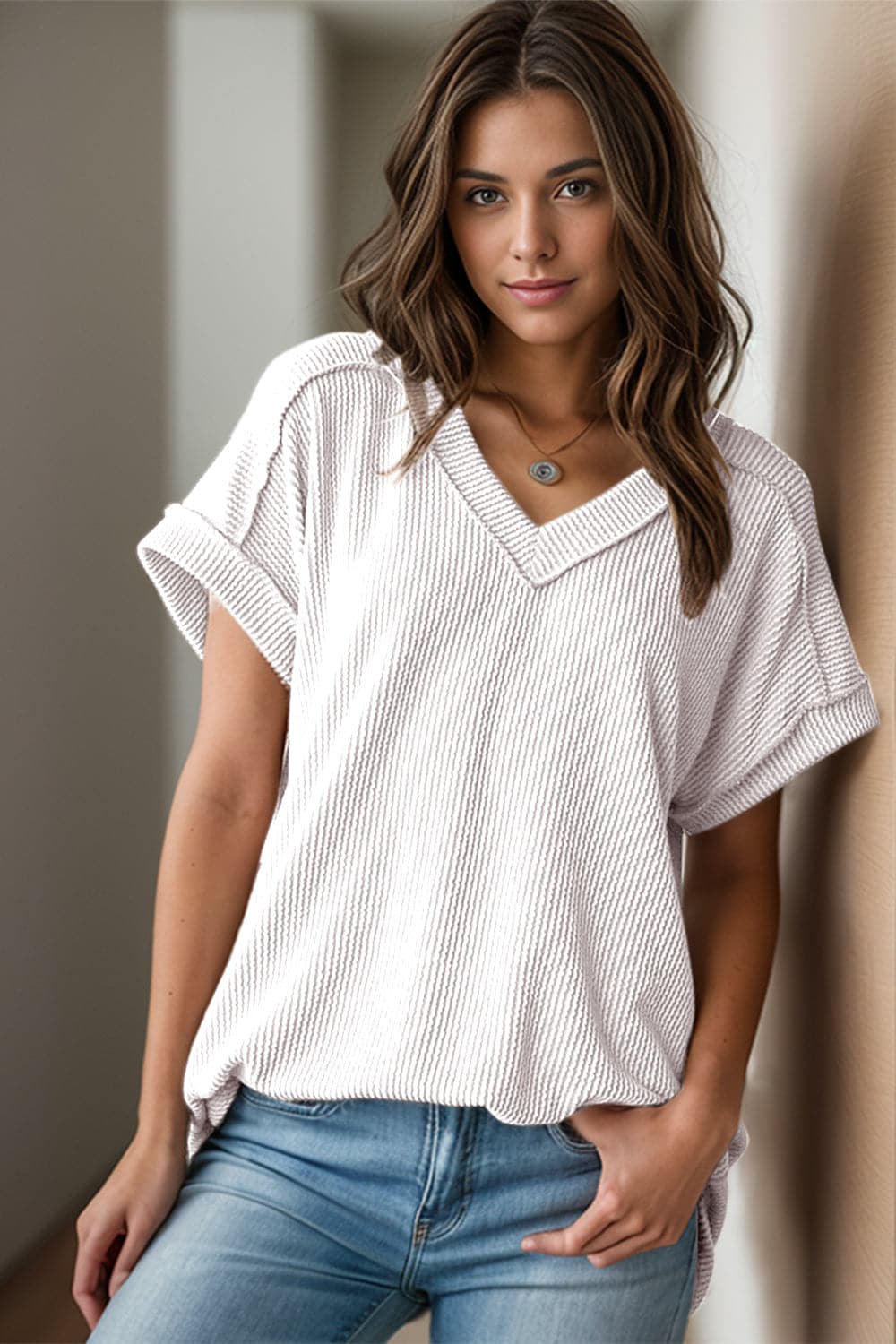 Textured V-Neck Short Sleeve Top.