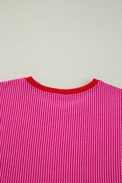 Vibrant pink corded edge drop shoulder long sleeve top