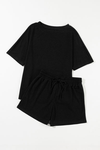 Chic black waffle knit tee and shorts ensemble