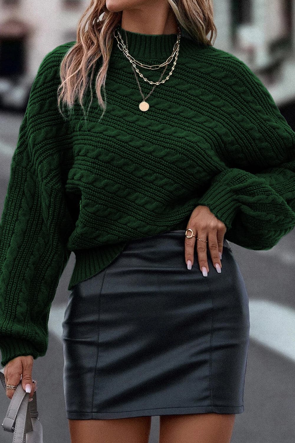 Cable-Knit Mock Neck Dropped Shoulder Sweater.