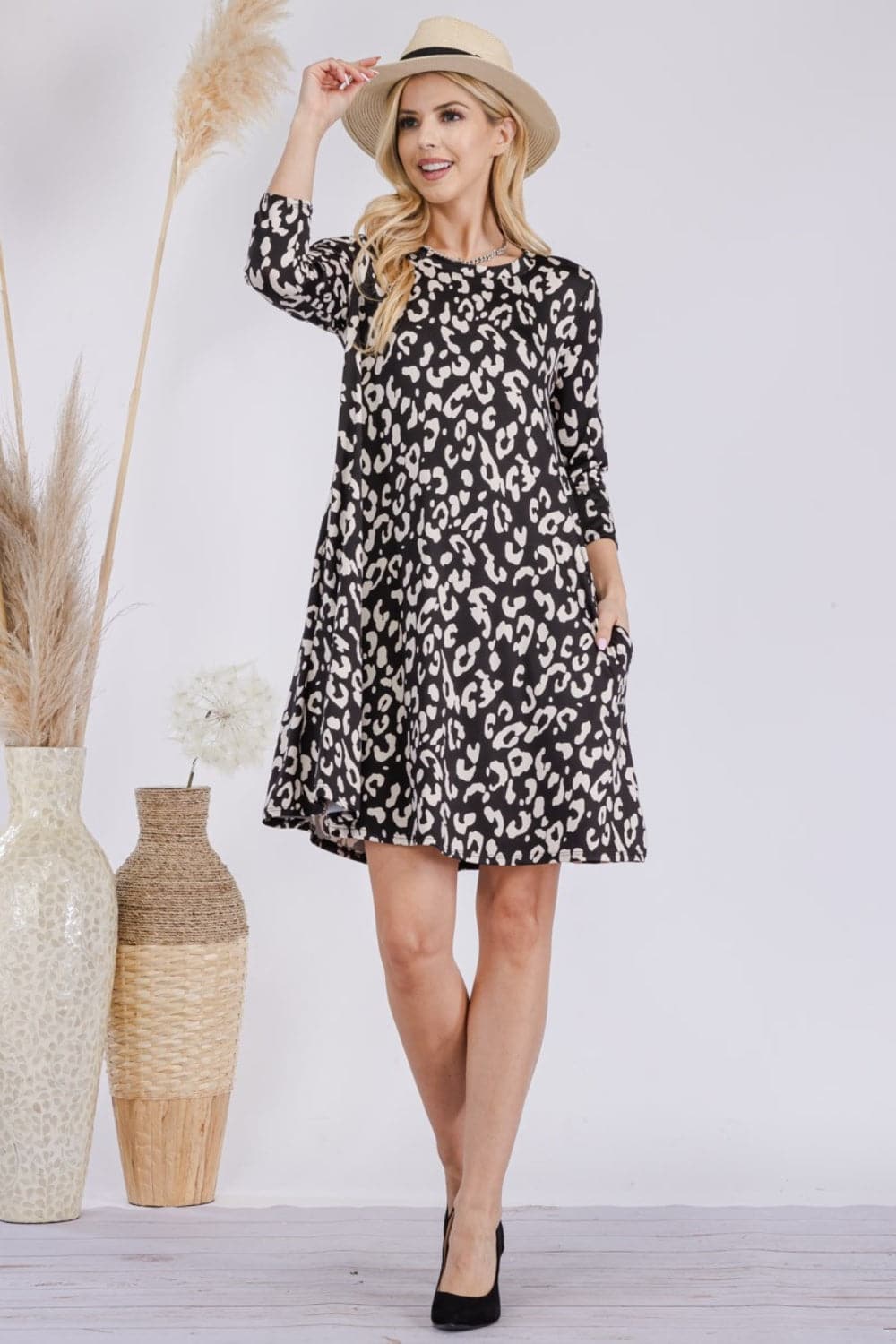 Celeste Full Size Leopard Three-Quarter Sleeve Dress with Pockets.