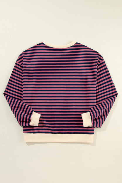 Cozy red striped oversized pullover with contrast trim