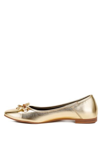 Metallic bow detail flats