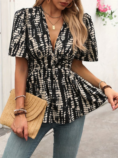 Printed V-Neck Half Sleeve Blouse.