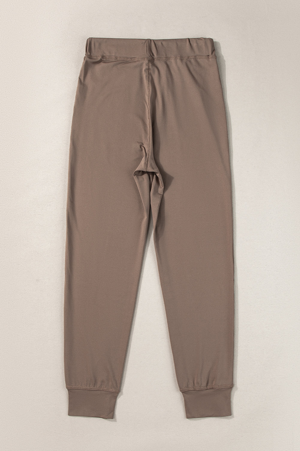 Cozy dark brown joggers with adjustable drawstring and pockets