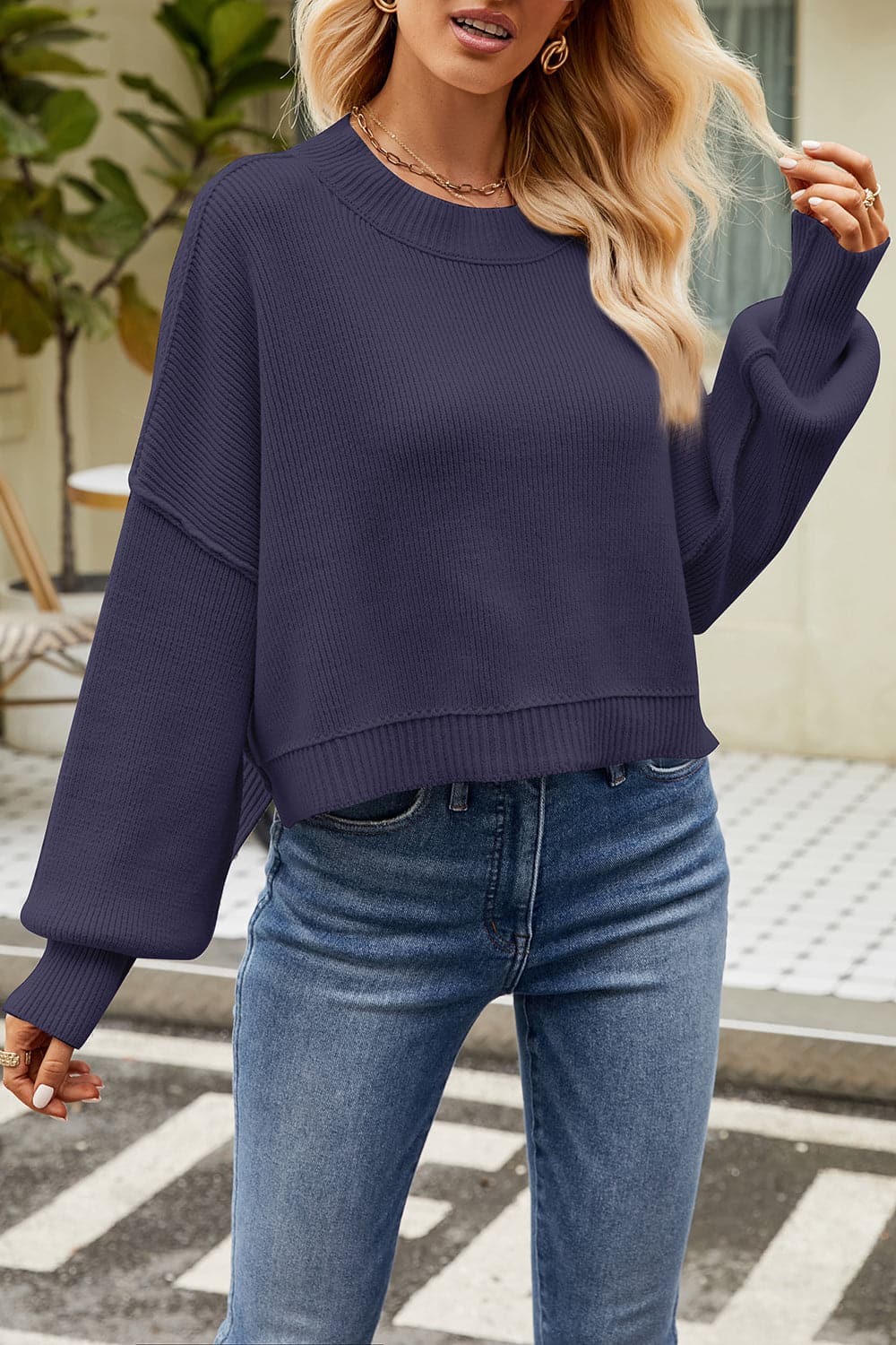 Round Neck Dropped Shoulder Sweater.